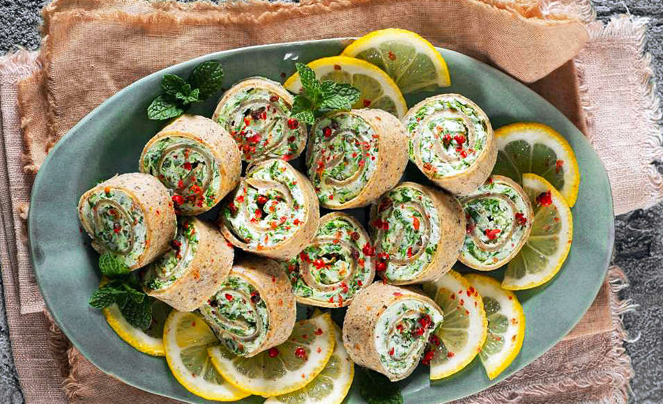 Rotolini di crespelle con spinacini e ricotta alla menta